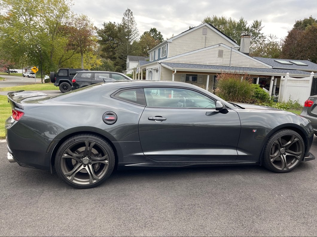 MP Concepts Old Glory Fuel Door; Matte Black (16-24 Camaro)