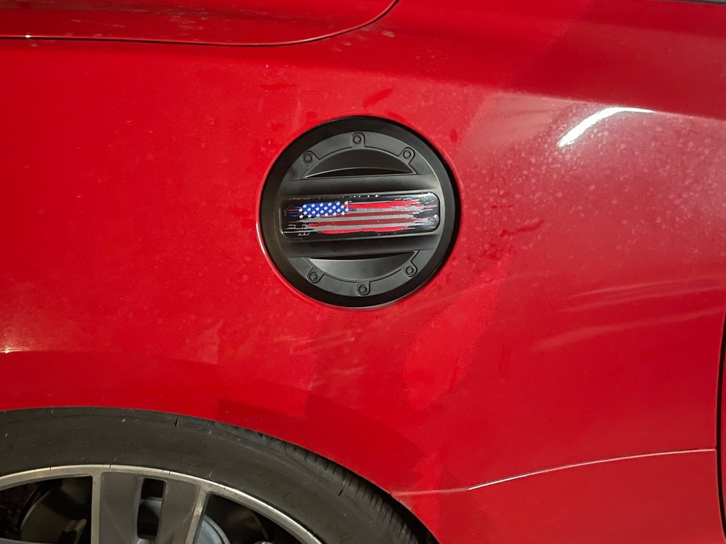 MP Concepts Old Glory Fuel Door; Matte Black (16-24 Camaro)